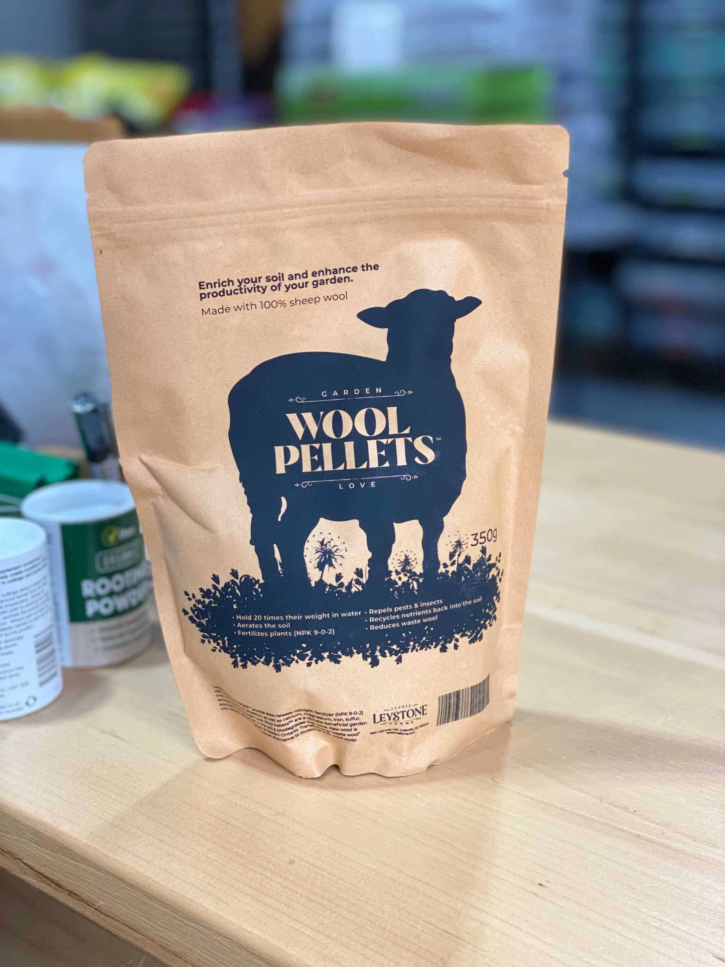 Wool Pellets by Leystone Farms bag on a store shelf.