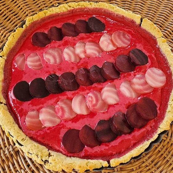 Beets Chioggia Guardsmark Heirloom with candy-cane swirls on a rustic tart.